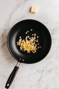 This image shows onions sautéing until golden