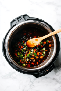 pouring-sauces-into-the-stir-fry
