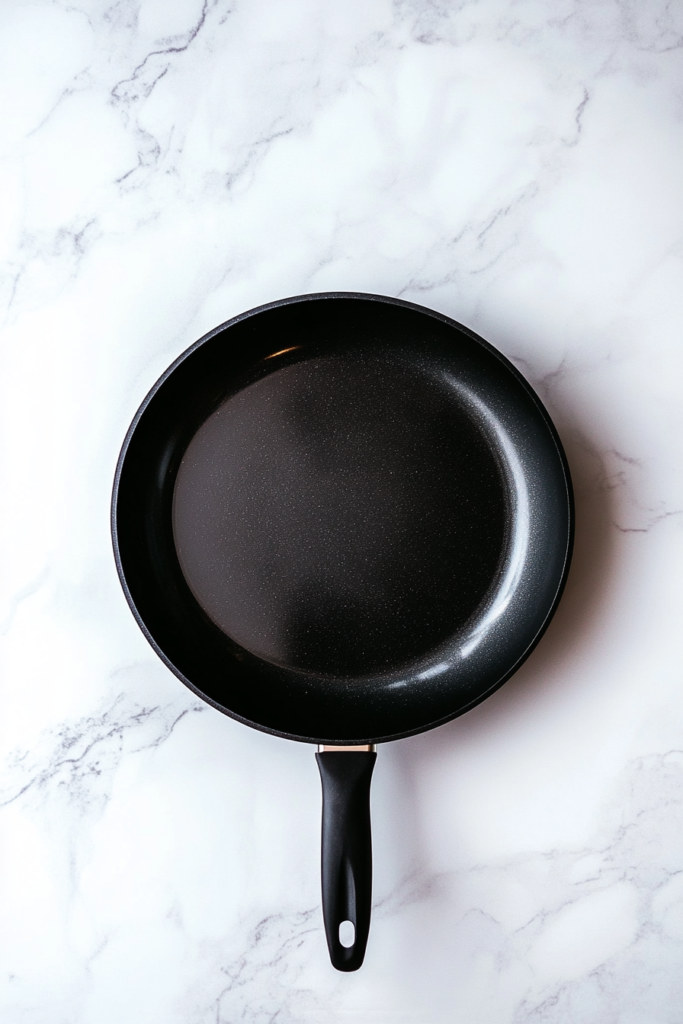 preheating-a-skillet-with-oil-for-cooking-chicken-2566017-683x1024