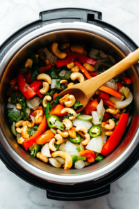 sauteing-onions-red-peppers-and-green-chili