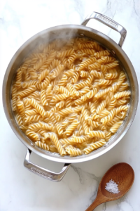 boiling-rotini-pasta-in-a-pot-of-salted-water-until-tender