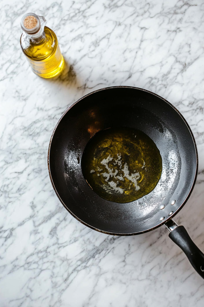 heating-oil-in-a-wok-for-deep-frying-2654238-683x1024